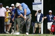 John Daly hits a tee shot from No. 8 during the first round of the PGA Championship. (Image Source: Getty)